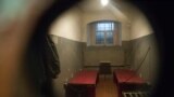 Looking through the peep hole at NKVD Pre-Trial Jail