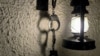 Handcuffs and a lantern