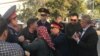 Kazakhstan - The police is attempting to take the activist to the courtroom. Shymkent, 25 October 2019 