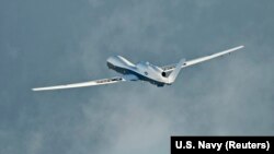 БПЛА MQ-4C Triton завершает свой первый перелет на авиабазе ВМС Патаксент-Ривер, штат Мэриленд, США, 18 сентября 2014 года