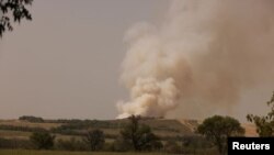 Smoke rises following recent Russian shelling in Pazeno area