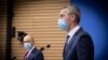 NATO Secretary-General Jens Stoltenberg (right) and and Ukrainian Prime Minister Denys Shmyhal attend a joint press conference following their meeting in Brussels, February 9, 2021