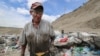 Kazakhstan. A man at a landfill in the Almaty region. June 22, 2021